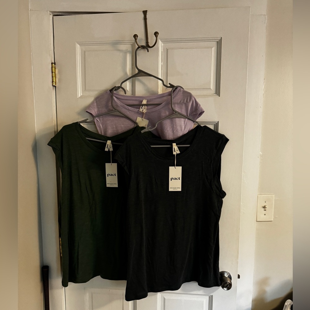 Brand new with tags Set of three sleeveless Pact tshirts
